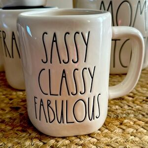 Ray Dunn coffee cup mug white used but in good condition sassy classy fabulous.